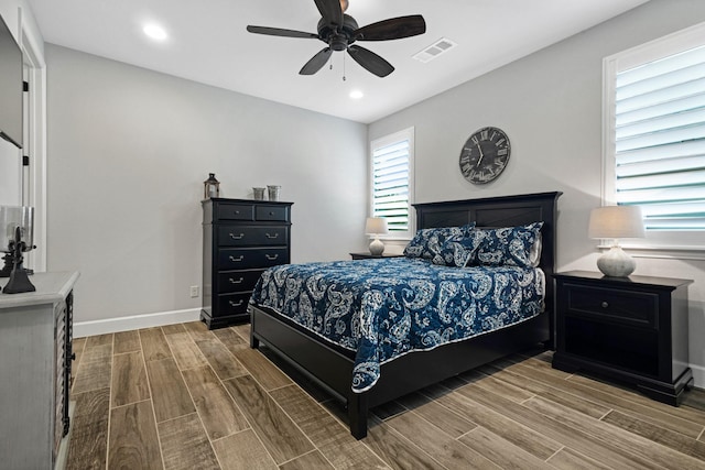 8217 American Way, Denton, TX 76207 - bedroom featuring wood finish floors, baseboards, a ceiling fan, and recessed lighting
