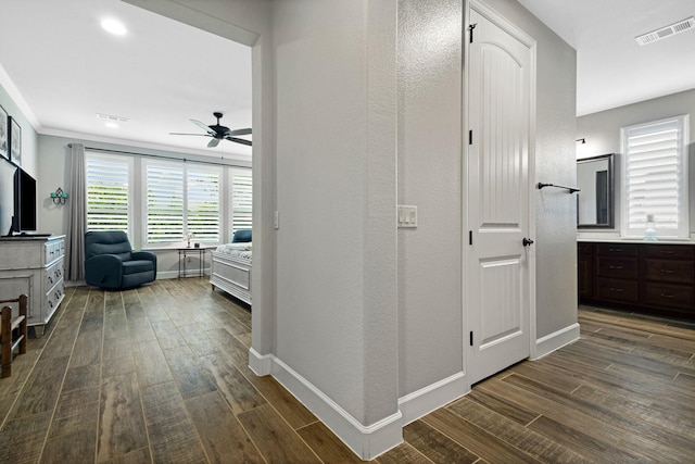 8217 American Way, Denton, TX 76207 - hallway with dark wood-style flooring and baseboards