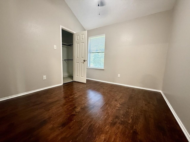 1001 Schrade Trl, Mesquite, TX 75181 - unfurnished bedroom featuring vaulted ceiling, wood finished floors, and baseboards