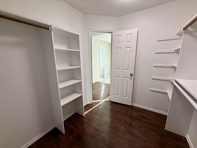 1001 Schrade Trl, Mesquite, TX 75181 - spacious closet with wood finished floors