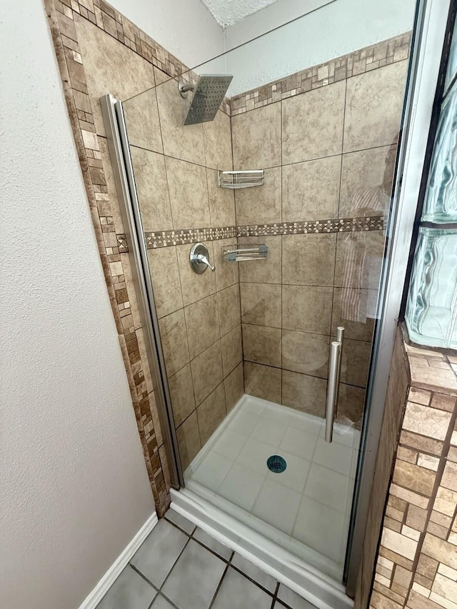 1001 Schrade Trl, Mesquite, TX 75181 - bathroom featuring a stall shower and tile patterned floors