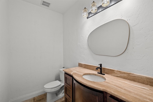 1228 Copano Dr, Allen, TX 75013 - half bath featuring vanity, toilet, and baseboards