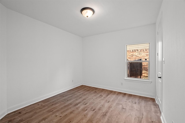 1228 Copano Dr, Allen, TX 75013 - spare room with wood finished floors and baseboards