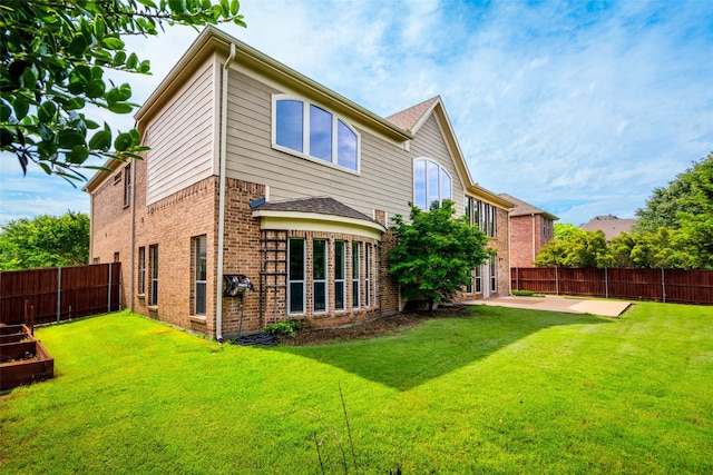 1228 Copano Dr, Allen, TX 75013 - back of property featuring a patio area and brick siding