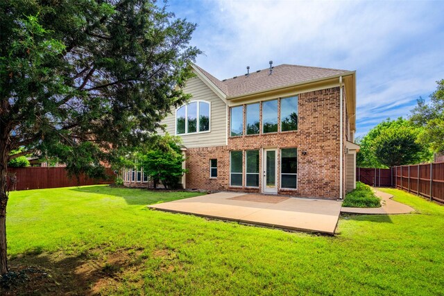 1228 Copano Dr, Allen, TX 75013 - back of property with a patio area and brick siding
