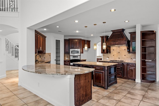 1228 Copano Dr, Allen, TX 75013 - kitchen with stainless steel appliances, light tile patterned floors, a sink, backsplash, and recessed lighting