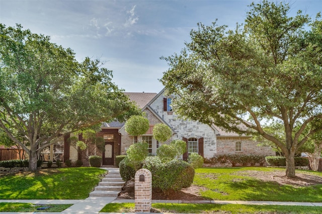 511 Cloud View Ct, Prosper, TX 75078 - view of front of property featuring a front yard, brick siding, and roof with shingles
