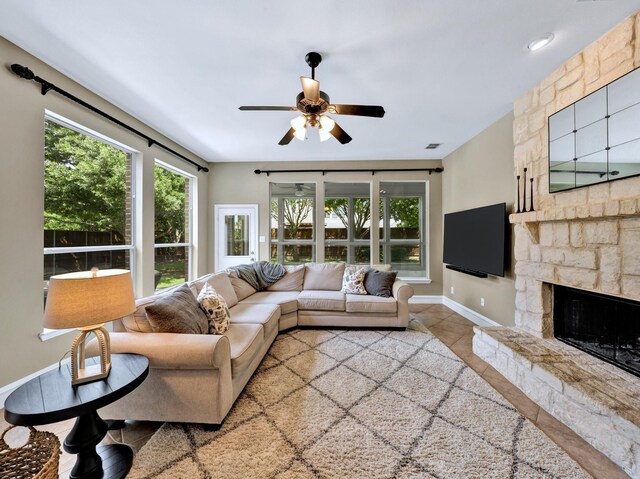 511 Cloud View Ct, Prosper, TX 75078 - unfurnished living room with a stone fireplace, stairs, arched walkways, and tile patterned floors