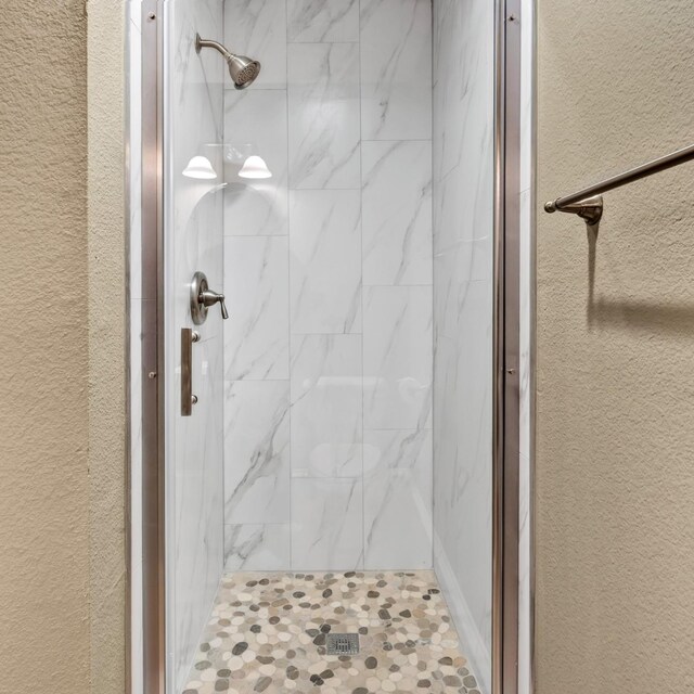 511 Cloud View Ct, Prosper, TX 75078 - bathroom featuring tile patterned floors and a shower with door