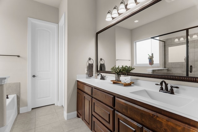 2402 Wilson Dr, Anna, TX 75409 - bathroom featuring double vanity, a stall shower, tile patterned flooring, and a bath