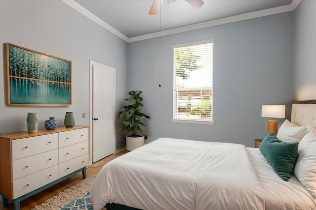 316 Cottonwood Trl, Shady Shores, TX 76208 - bedroom featuring crown molding, wood finished floors, and a ceiling fan