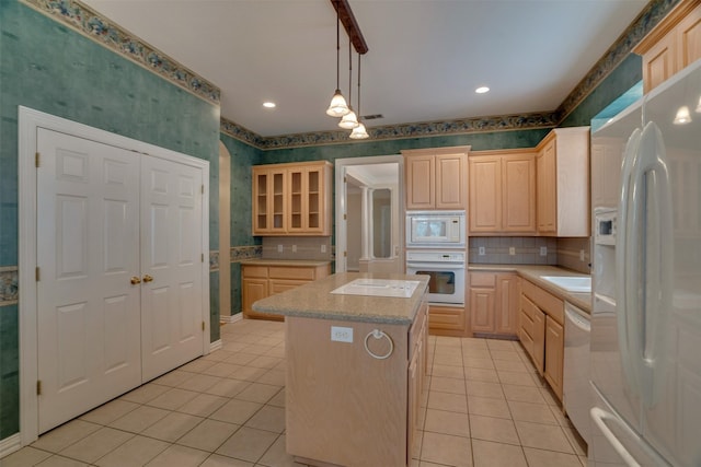 9 Park Place Ct, Wichita Falls, TX 76302 - kitchen featuring white appliances, wallpapered walls, light brown cabinets, light tile patterned floors, and a center island
