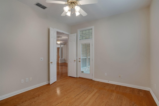 9 Park Place Ct, Wichita Falls, TX 76302 - empty room featuring a ceiling fan, baseboards, and light wood-style flooring