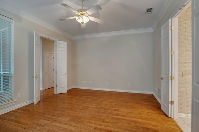 9 Park Place Ct, Wichita Falls, TX 76302 - unfurnished bedroom with light wood-type flooring, baseboards, ornamental molding, and a ceiling fan