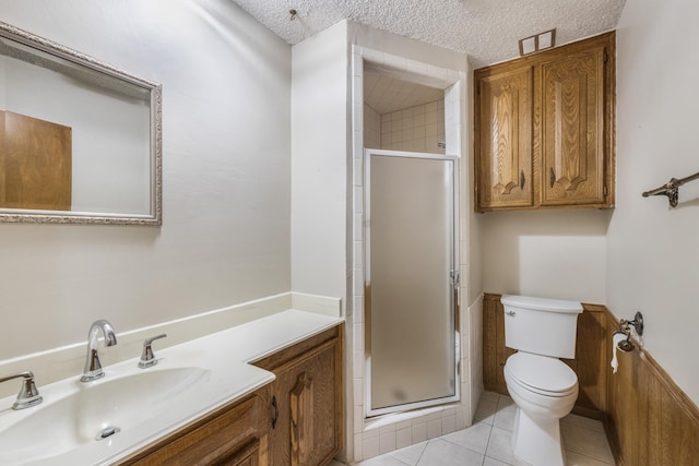 4508 Ramsgate Ct, Arlington, TX 76013 - full bathroom with toilet, a shower stall, vanity, tile patterned flooring, and a textured ceiling