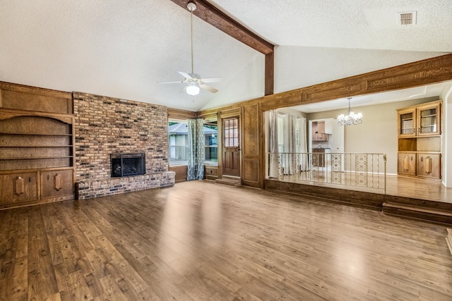 4508 Ramsgate Ct, Arlington, TX 76013 - unfurnished living room featuring ceiling fan, wood finished floors, a chandelier, beamed ceiling, and a textured ceiling