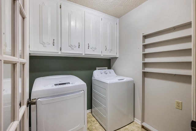 4508 Ramsgate Ct, Arlington, TX 76013 - washroom featuring washer and clothes dryer, cabinet space, and a textured ceiling