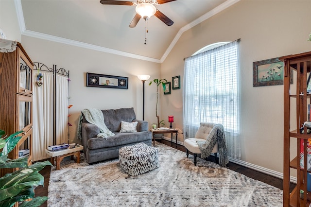 11408 Aquilla Dr, Frisco, TX 75036 - living room featuring ornamental molding, vaulted ceiling, a ceiling fan, wood finished floors, and baseboards