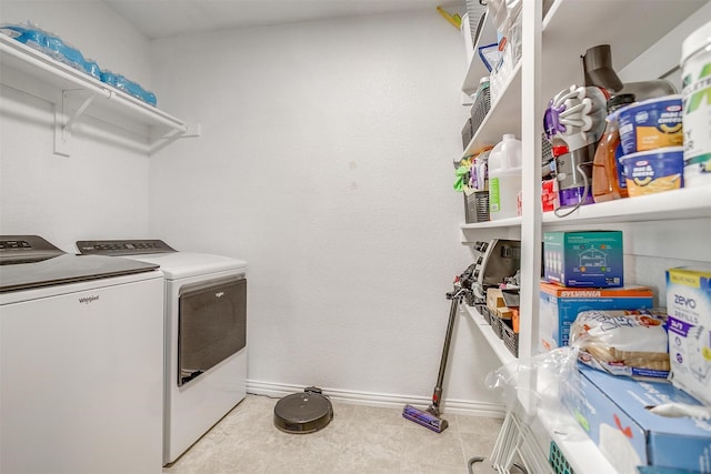 2924 Whitetail Chase Dr, Fort Worth, TX 76108 - washroom featuring washer and clothes dryer, baseboards, and tile patterned floors