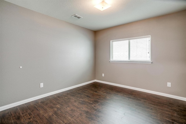 2924 Whitetail Chase Dr, Fort Worth, TX 76108 - unfurnished room with baseboards and dark wood-type flooring