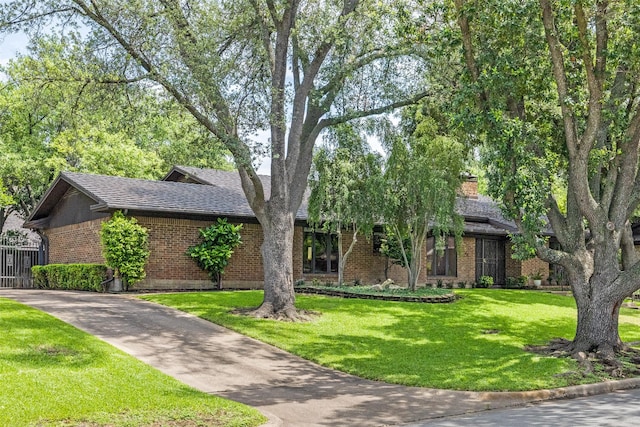 23 Crosslands Rd, Benbrook, TX 76132 - view of front of house featuring brick siding and a chimney