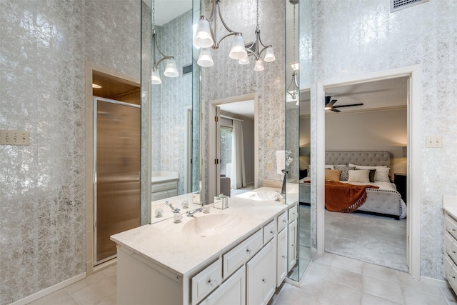 23 Crosslands Rd, Benbrook, TX 76132 - ensuite bathroom with vanity, wallpapered walls, tile patterned flooring, a shower stall, and ceiling fan