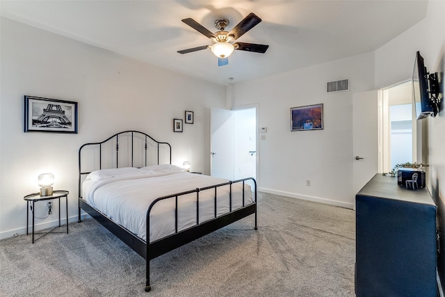 3320 Douglas Ave Unit C, Dallas, TX 75219 - carpeted bedroom with baseboards and a ceiling fan