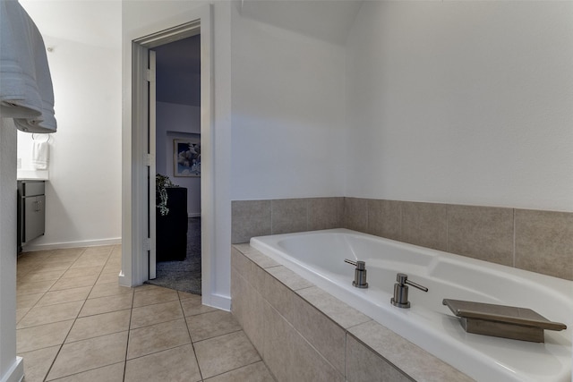 3320 Douglas Ave Unit C, Dallas, TX 75219 - bathroom featuring a bath and tile patterned floors
