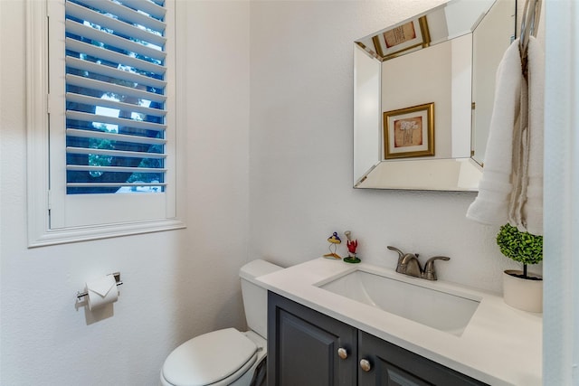 3320 Douglas Ave Unit C, Dallas, TX 75219 - bathroom featuring vanity and toilet
