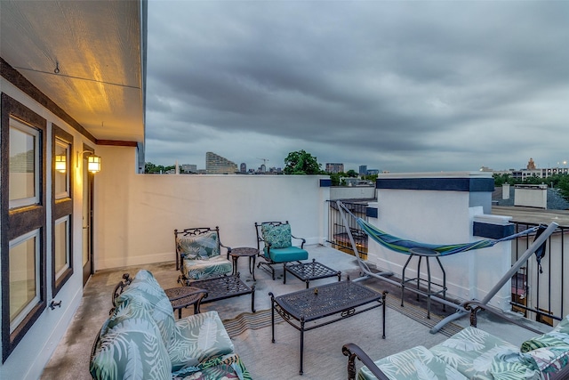 3320 Douglas Ave Unit C, Dallas, TX 75219 - view of patio featuring outdoor lounge area and a balcony