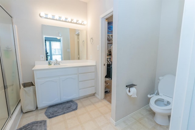 10940 Dillon St, Fort Worth, TX 76179 - full bath featuring an enclosed shower, vanity, a walk in closet, toilet, and tile patterned floors