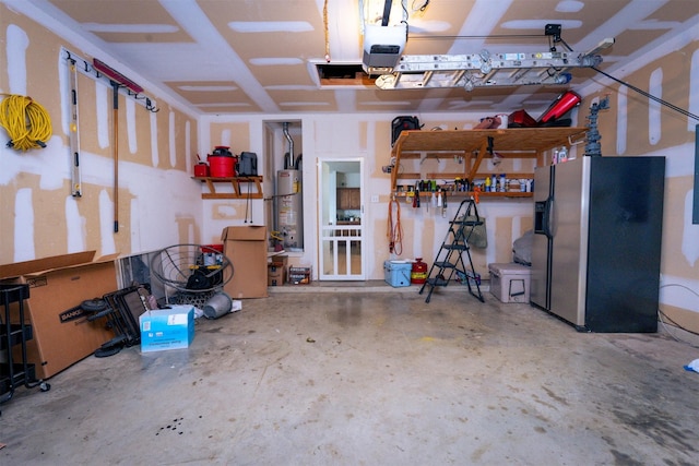 10940 Dillon St, Fort Worth, TX 76179 - garage featuring stainless steel fridge, a garage door opener, and gas water heater