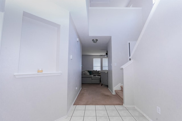 10940 Dillon St, Fort Worth, TX 76179 - hall featuring stairway, carpet, tile patterned floors, and baseboards