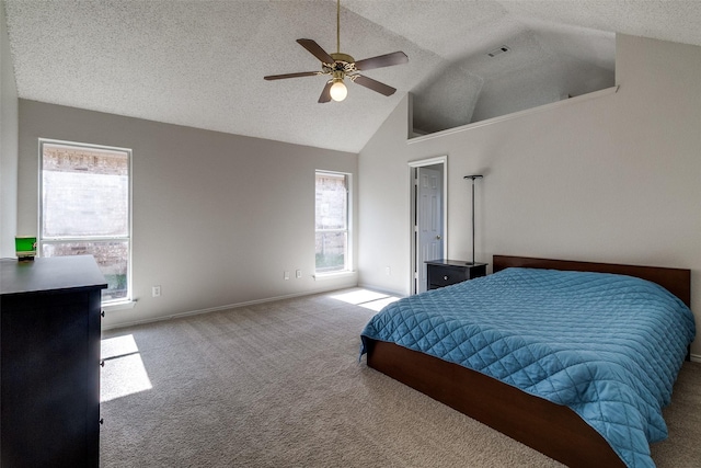 1721 Chapman Dr, Mesquite, TX 75149 - carpeted bedroom with a textured ceiling, high vaulted ceiling, a ceiling fan, and baseboards