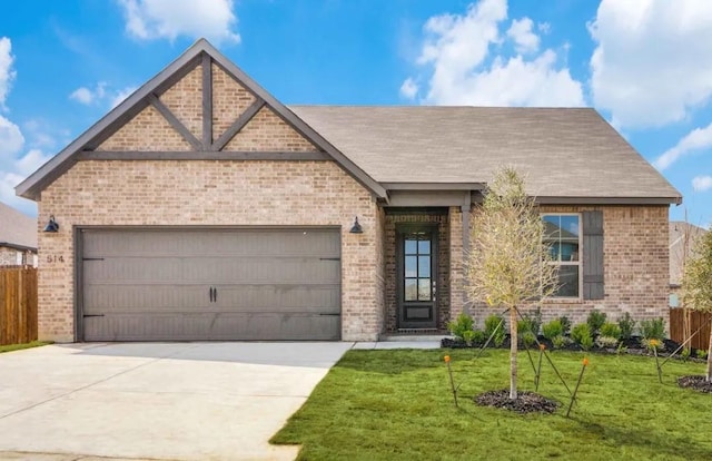 514 Hillcrest Cir, Justin, TX 76247 - view of front of property with brick siding, concrete driveway, an attached garage, and a shingled roof