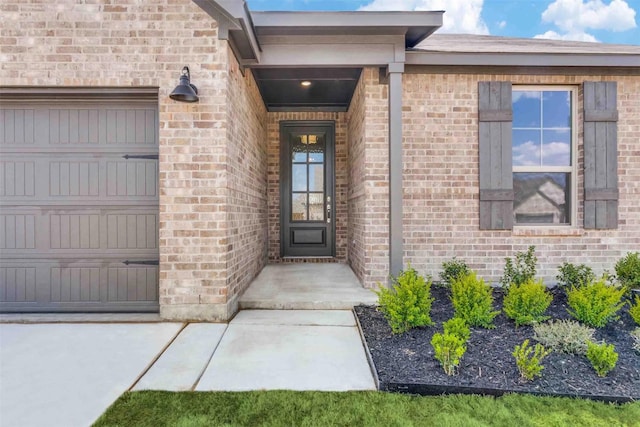 514 Hillcrest Cir, Justin, TX 76247 - entrance to property featuring brick siding and an attached garage