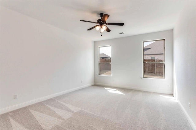 514 Hillcrest Cir, Justin, TX 76247 - carpeted empty room with baseboards and a ceiling fan