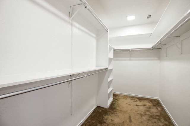 8907 Meadowknoll Dr, Dallas, TX 75243 - spacious closet featuring carpet floors