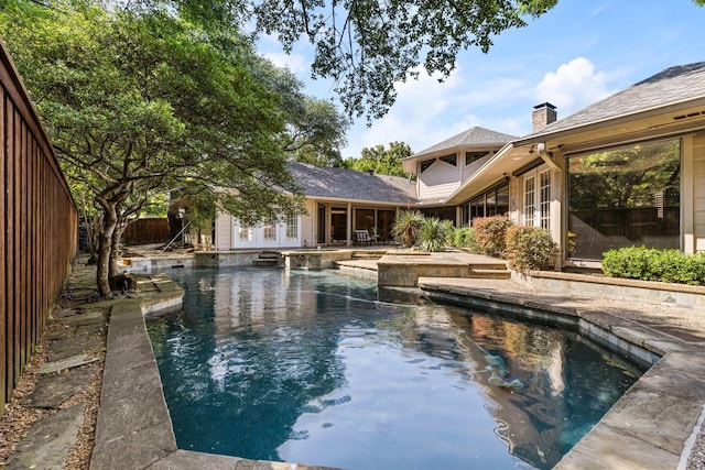 8907 Meadowknoll Dr, Dallas, TX 75243 - view of swimming pool with french doors, a patio, and a pool with connected hot tub
