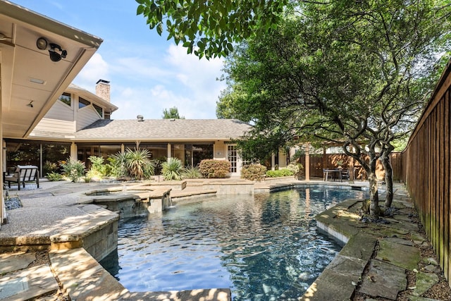8907 Meadowknoll Dr, Dallas, TX 75243 - view of swimming pool featuring a patio, a fenced backyard, and a pool with connected hot tub