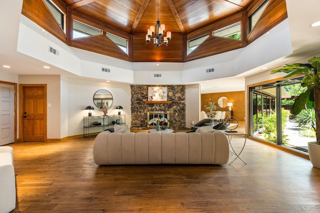 8907 Meadowknoll Dr, Dallas, TX 75243 - living area with a high ceiling, baseboards, wood finished floors, wooden ceiling, and a chandelier