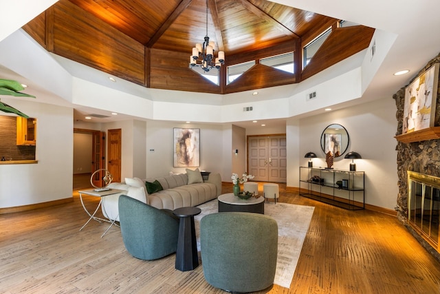 8907 Meadowknoll Dr, Dallas, TX 75243 - living area featuring a high ceiling, baseboards, a fireplace, wood ceiling, and wood finished floors