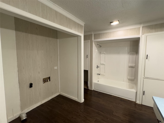 921 Longino St, Sulphur Springs, TX 75482 - laundry room with dark wood-style flooring, crown molding, a textured ceiling, and baseboards