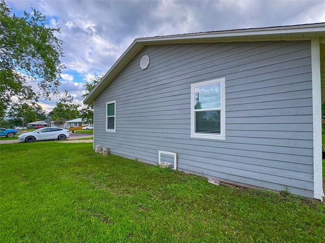 921 Longino St, Sulphur Springs, TX 75482 - view of property exterior with a yard
