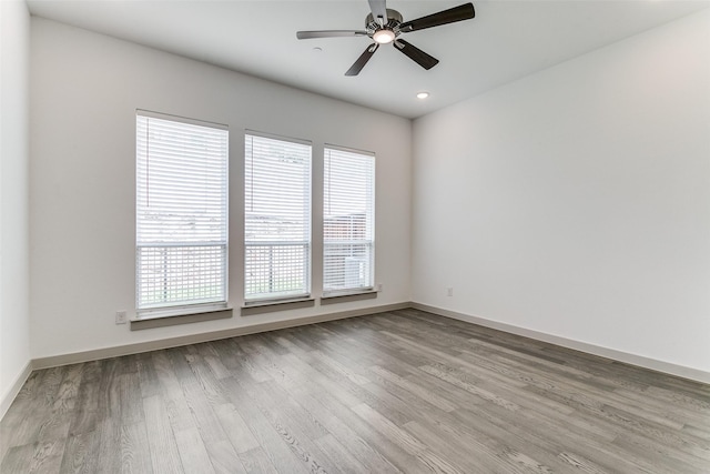 135 Claire Dr, Trophy Club, TX 76262 - spare room featuring wood finished floors, a ceiling fan, baseboards, and recessed lighting