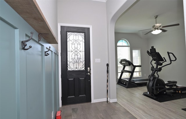 3614 Brighton Dr, Midlothian, TX 76065 - entryway featuring arched walkways, wood finished floors, a ceiling fan, and baseboards