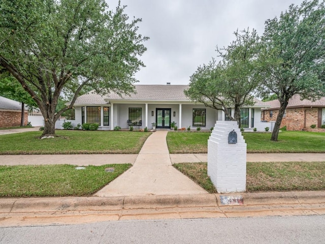 3414 Country Club Rd, Pantego, TX 76013 - ranch-style home featuring french doors, a front yard, and roof with shingles