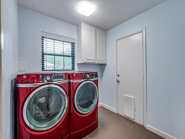 3414 Country Club Rd, Pantego, TX 76013 - washroom featuring washer and clothes dryer, cabinet space, a textured ceiling, baseboards, and tile patterned floors