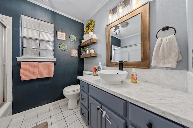 22 Buttercup Cir, Waco, TX 76708 - bathroom featuring crown molding, vanity, a shower with shower door, tile patterned flooring, and toilet
