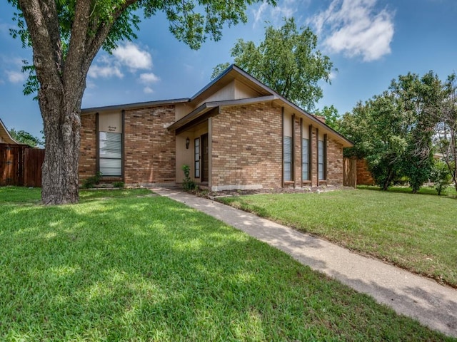 7015 Cloverglen Dr, Dallas, TX 75249 - mid-century modern home featuring brick siding